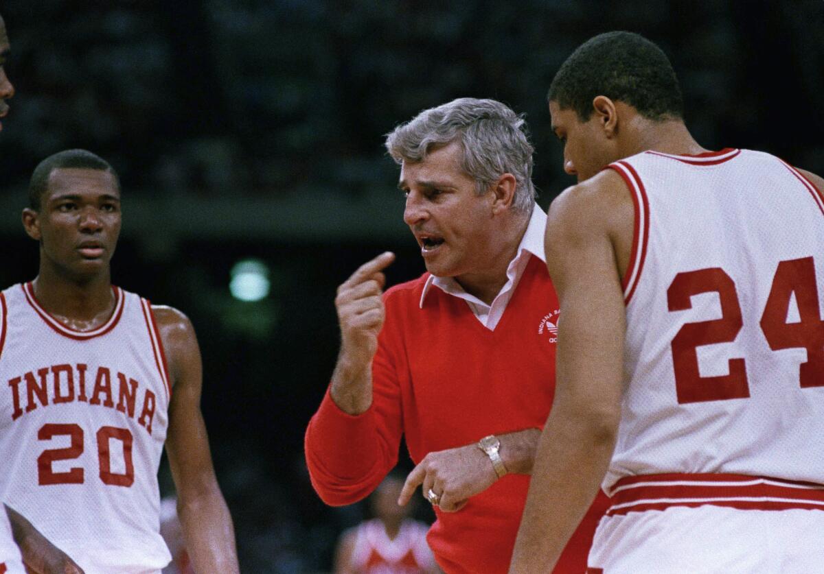Indiana coach Bobby Knight gestures while instructing his players during a game.