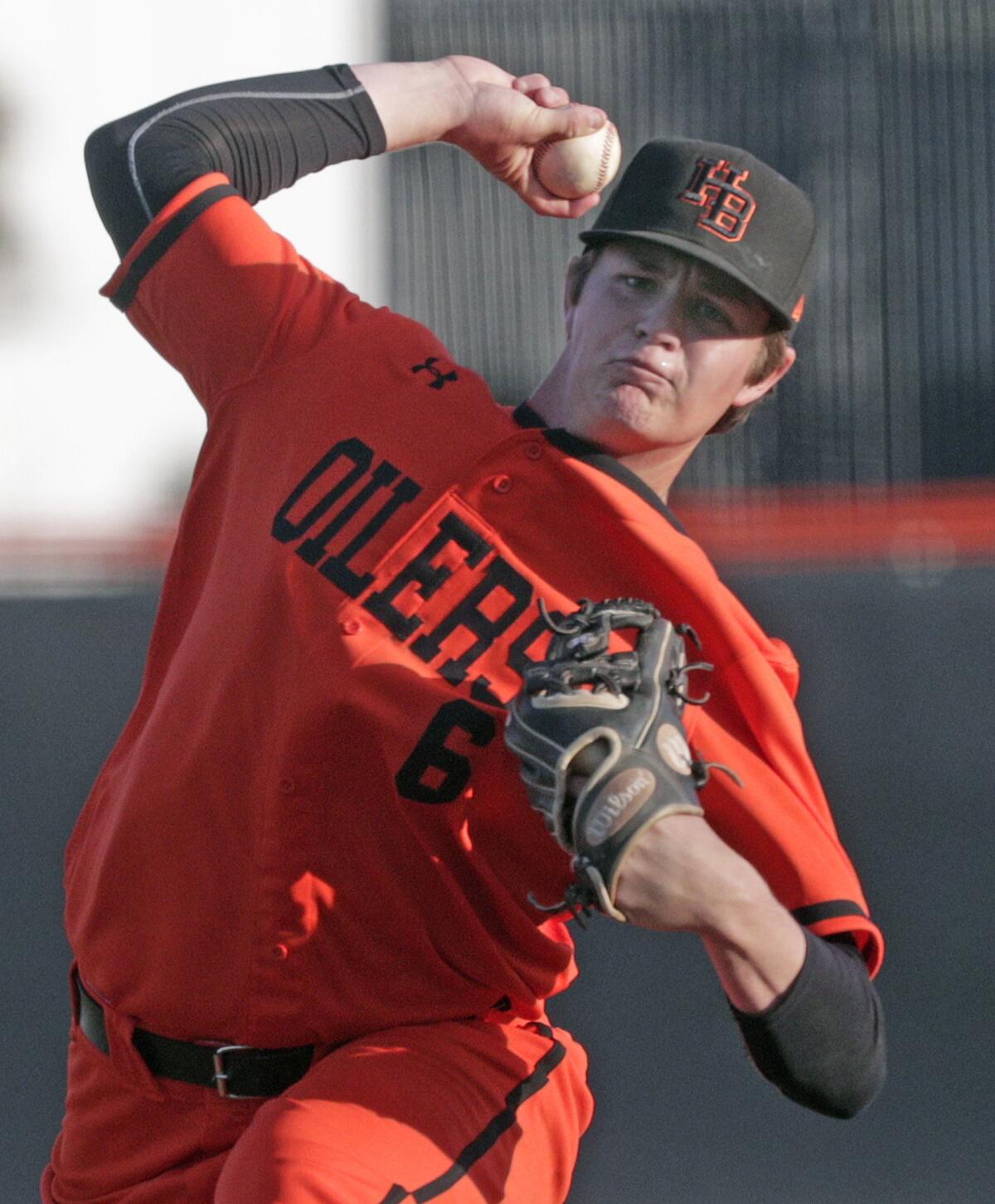Huntington Beach's Jack Smith pitches in relief against Harvard-Westlake in a nonleague game on Wednesday.