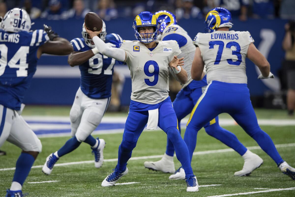 Rams quarterback Matthew Stafford (9) throws during a 2021 game against the Colts in Indianapolis.