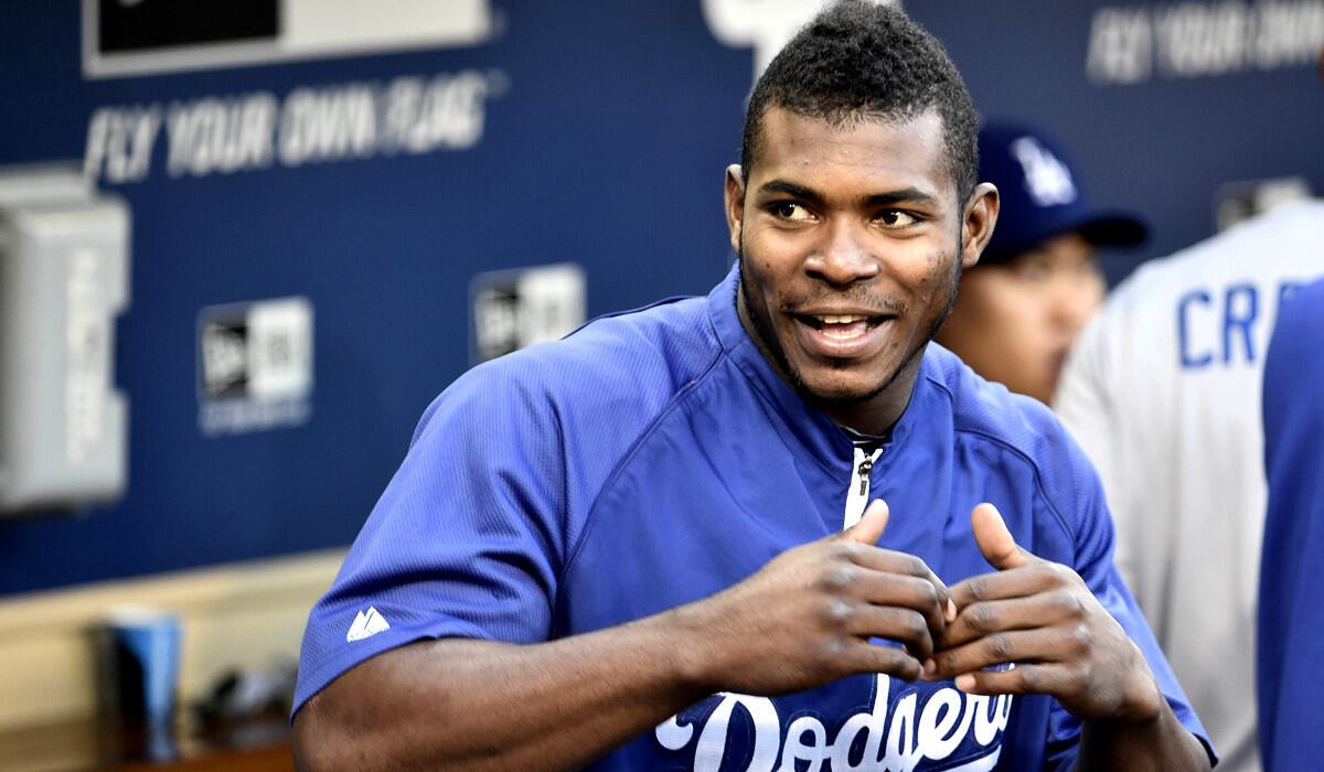 Center fielder Yasiel Puig and the Dodgers arrive at the stretch run in first place in the NL West.