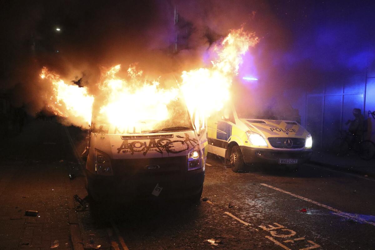 Police van on fire in Bristol, England