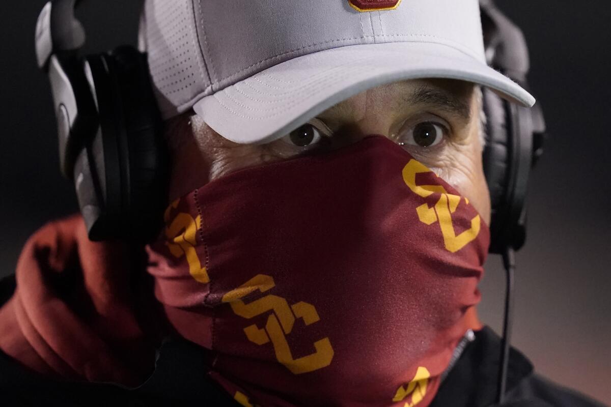 USC coach Clay Helton looks on following a game against Utah on Nov. 22, 2020.