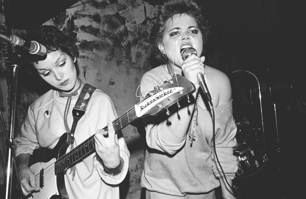 Jane Wiedlin and Belinda Carlisle of the Go-Go's are shown performing an early club gig.