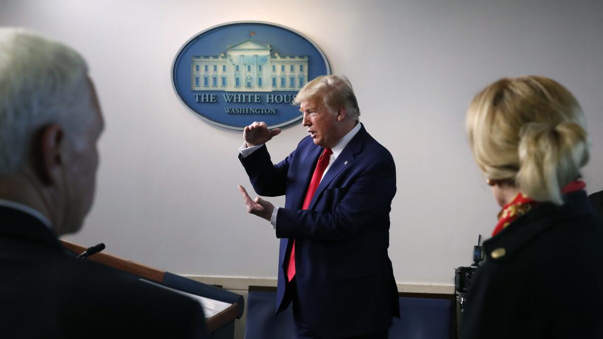 President Trump speaks about the coronavirus during a White House briefing on Tuesday.