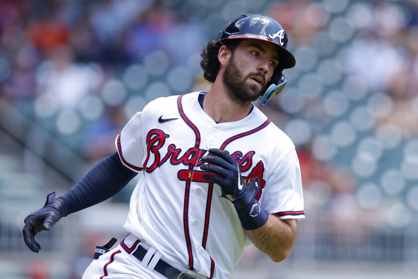 Atlanta Braves' Dansby Swanson rounds first on a leadoff home run in the first inning of a baseball game against the San Francisco Giants, Thursday, June 23, 2022, in Atlanta. (AP Photo/Todd Kirkland)