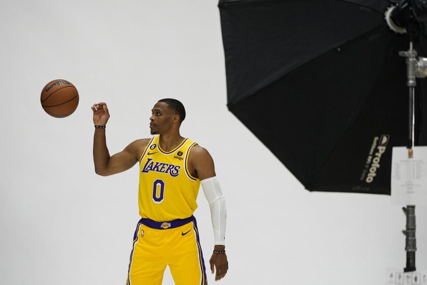 Los Angeles Lakers' Russell Westbrook poses for photos.