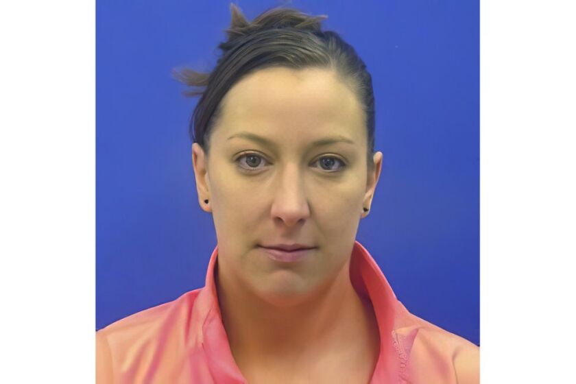 This driver's license photo from the Maryland Motor Vehicle Administration shows Ashli Babbitt.