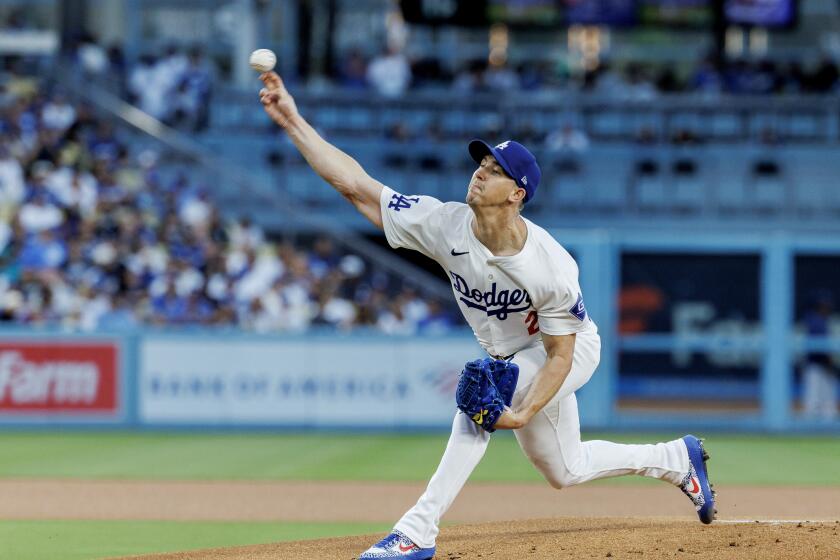 The Dodgers' Walker Buehler pitches against the Seattle Mariners at Dodger Stadium on Tuesday.