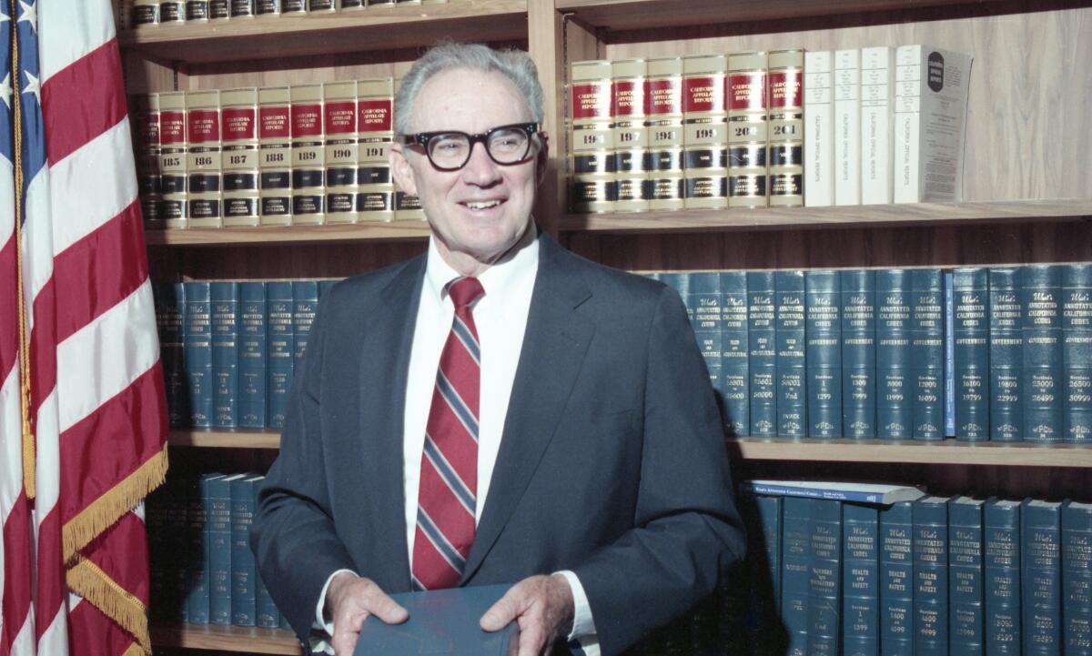 Judge William B. Enright in his chambers in 1990.