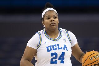 UCLA forward IImar'I Thomas (24) dribbles during an NCAA basketball game against Washington on Friday, Jan. 14, 2022, in Los Angeles. (AP Photo/Kyusung Gong)