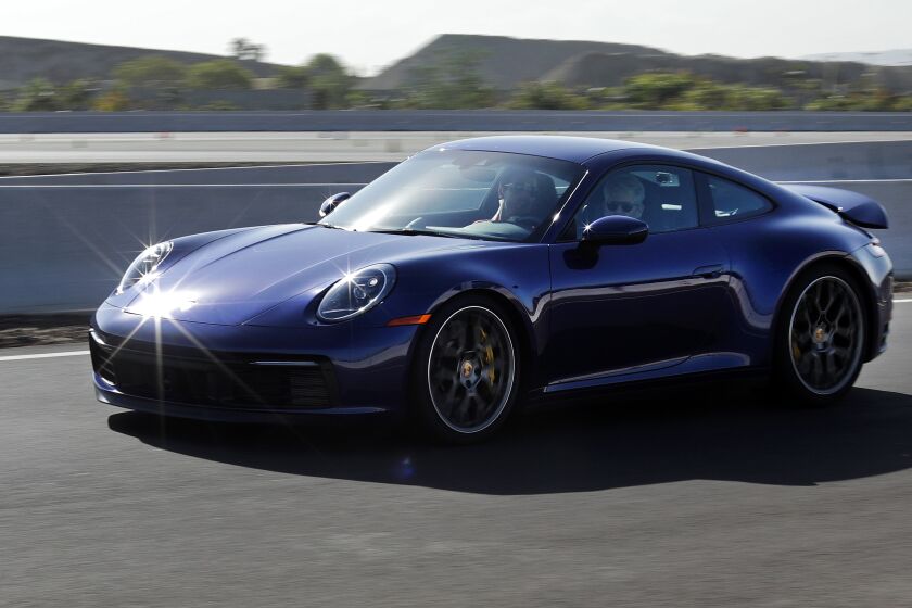 CARSON, CA -- NOVEMBER 26, 2019: The 2020 Porsche 911 Carrera 4S is powered by a 3-liter, 6-cylinder, twin-turbo engine that makes 443 horsepower and 390 pound-feet of torque. The 8-speed automatic will take the car up to a claimed top speed of 190 mph for the hard top and 188 mph for the cabriolet. The MSRP starts at $120,600 for the hard top. (Myung J. Chun / Los Angeles Times)
