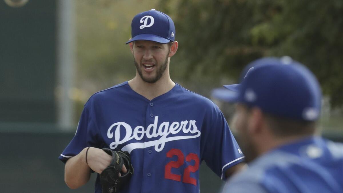 Dodgers starting pitcher Clayton Kershaw waits during a spring training baseball workout on Feb. 13.