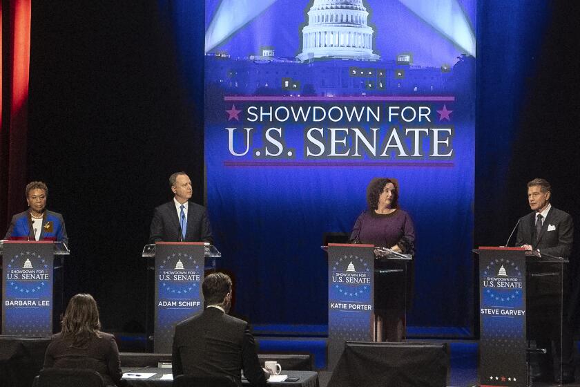 FILE -Candidates, from left, U.S. Rep. Barbara Lee, D-Calif., U.S. Rep. Adam Schiff, D-Calif., U.S. Rep. Katie Porter, D-Calif., and former baseball player Steve Garvey, stand on stage during a televised debate for candidates in the senate race to succeed the late California Sen. Dianne Feinstein, on Monday, Jan. 22, 2024, in Los Angeles. (AP Photo/Damian Dovarganes, File)