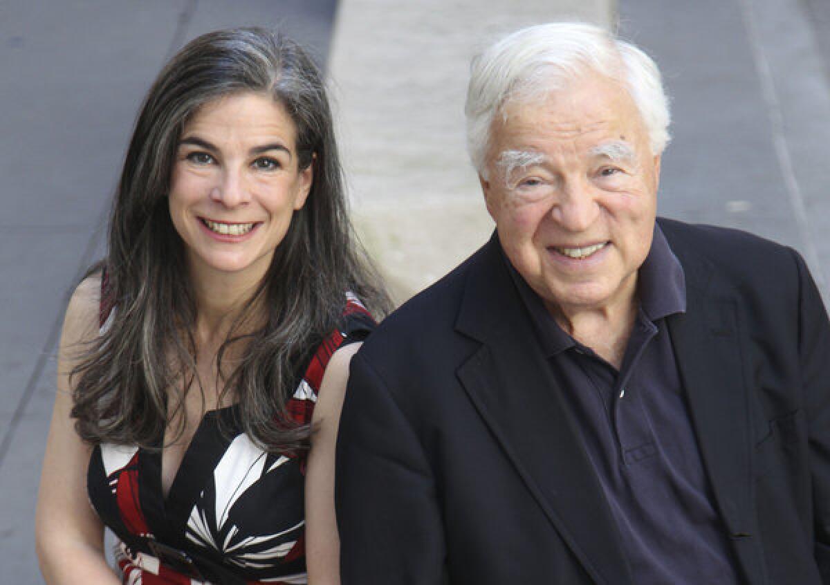 Arthur Frommer with his daughter, Pauline Frommer, in New York.
