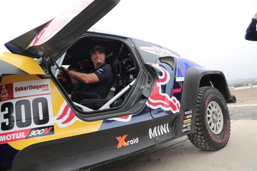 Spanish driver Carlos Sainz attends the technical inspection of his Mini car for the Dakar Rally 2019, in Lima, Peru, 6 January 2019. EFE-EPA/ Ernesto Arias