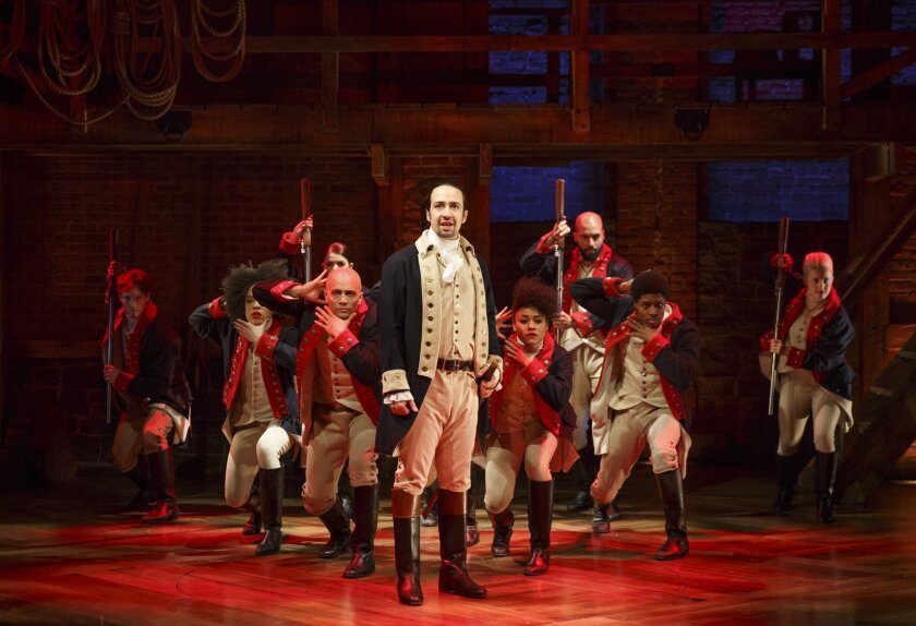 Lin-Manuel Miranda, center, performs in the musical "Hamilton" at The Public Theater in New York.