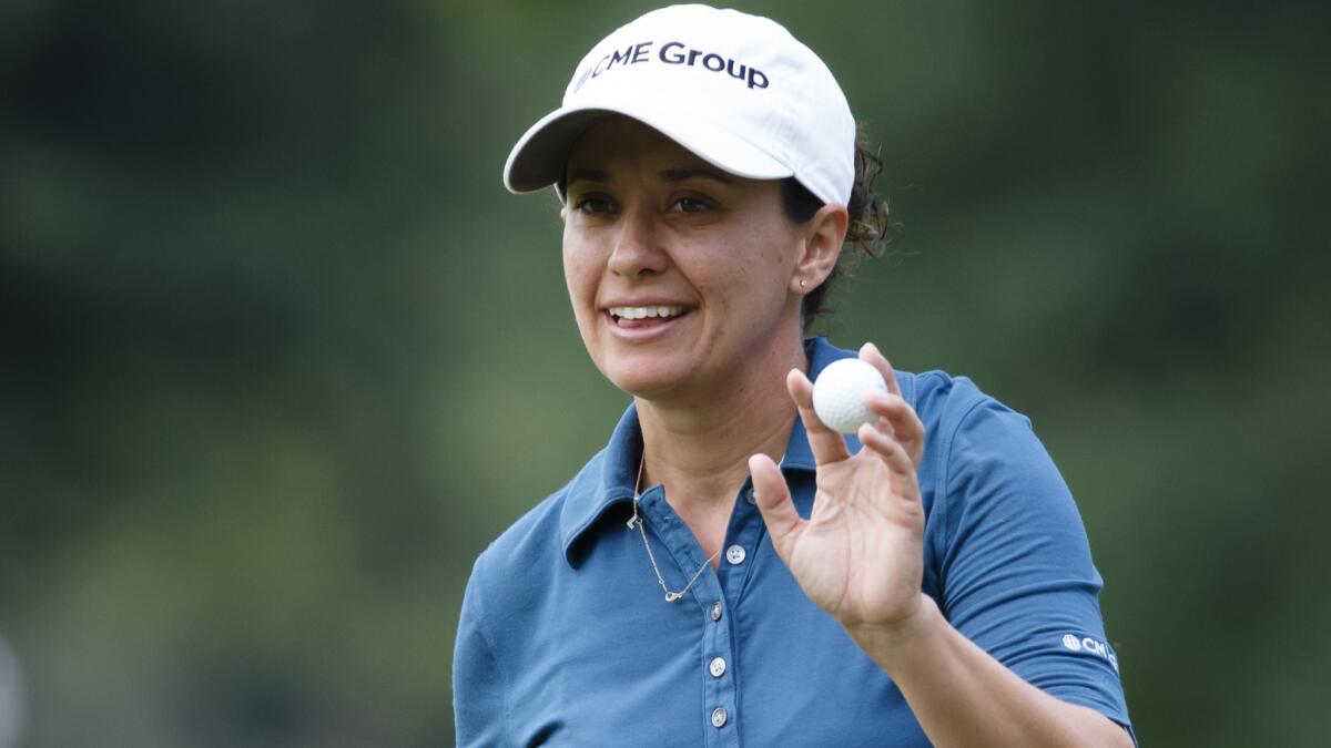 Mo Martin acknowledges the crowd after sinking a putt during the final round of the Marathon Classic on Sunday. Martin is still trying to make sense of the magnitude of her victory at the Women's British Open.