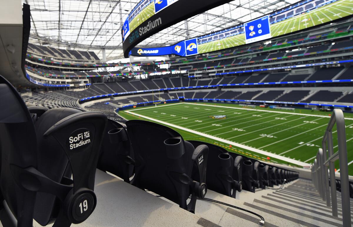 A view of SoFi Stadium from several rows up from the field.