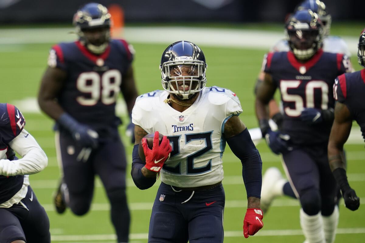 Tennessee Titans running back Derrick Henry scores a touchdown against the Houston Texans in January.