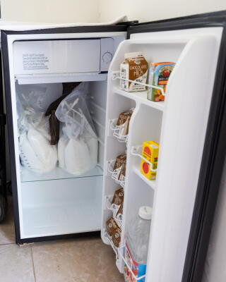 medication is stored in a small refrigerator.