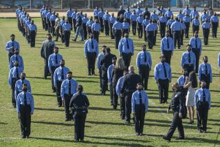 RESEDA, CA - NOVEMBER 10, 2021: Command staff from the Los Angeles Police Department and members of the LAUSD school police conduct a formal inspection of 230 cadets/students who attend the Police Academy Magnet at Reseda Charter High School. (Mel Melcon / Los Angeles Times)