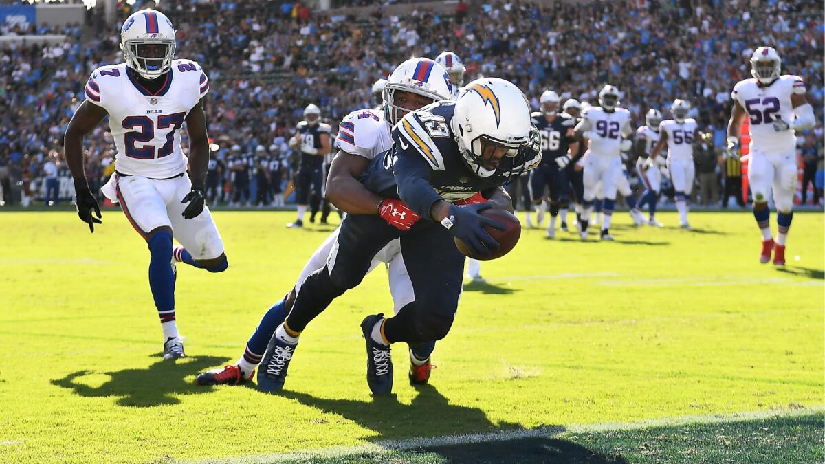 Chargers receiver Keenan Allen reaches for the end zone to score a touchdown against the Bills in the 2nd quarter.