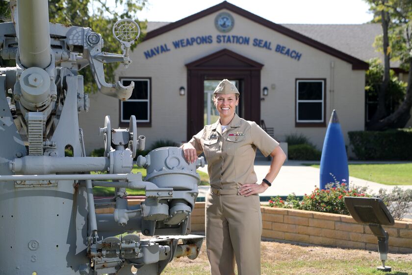SEAL BEACH, CA - August 02: Navy Capt. Jessica J. OOBrien is the new commanding officer for the Naval Weapons Station in Seal Beach, CA. OOBrien is the first woman to command the base and previously led a San Diego-based landing craft battalion that trains to move Marines from ships onto adversarial coastlines. She has the important job of overseeing the completion of a new $154-million ammunition pier that will allow larger ships to dock in Seal Beach. (Kevin Chang / TimesOC)