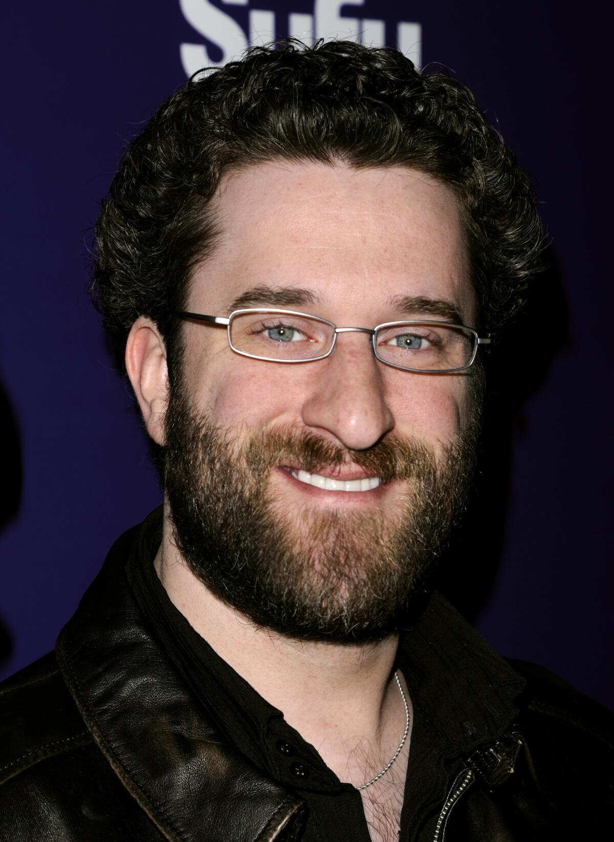 Actor Dustin Diamond smiles for the camera in 2011