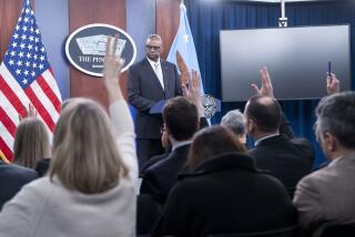 Defense Secretary Lloyd Austin takes question from reporter during a Pentagon press briefing at the Pentagon on Thursday, Feb. 1, 2024 in Washington. (AP Photo/Kevin Wolf)