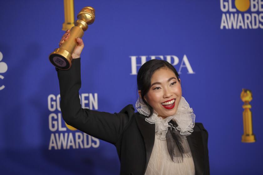 BEVERLY HILLS, CA-JANUARY 05: Awkwafina in the photo deadline room at the 77th Golden Globe Awards at the Beverly Hilton on January 05, 2020 (Allen J. Schaben / Los Angeles Times)