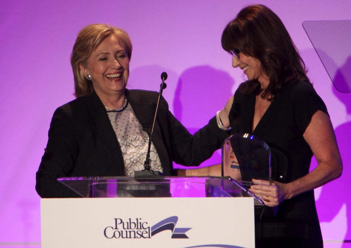 Hillary Clinton accepts the William O. Douglas Award from Public Counsel, a nonprofit law firm. Presenting the honor is her good friend, actress and philanthropist Mary Steenburgen.