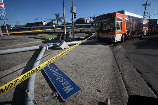 A Metro bus collided with a Blue Line train at Washington Boulevard and San Pedro Street near downtown Los Angeles.