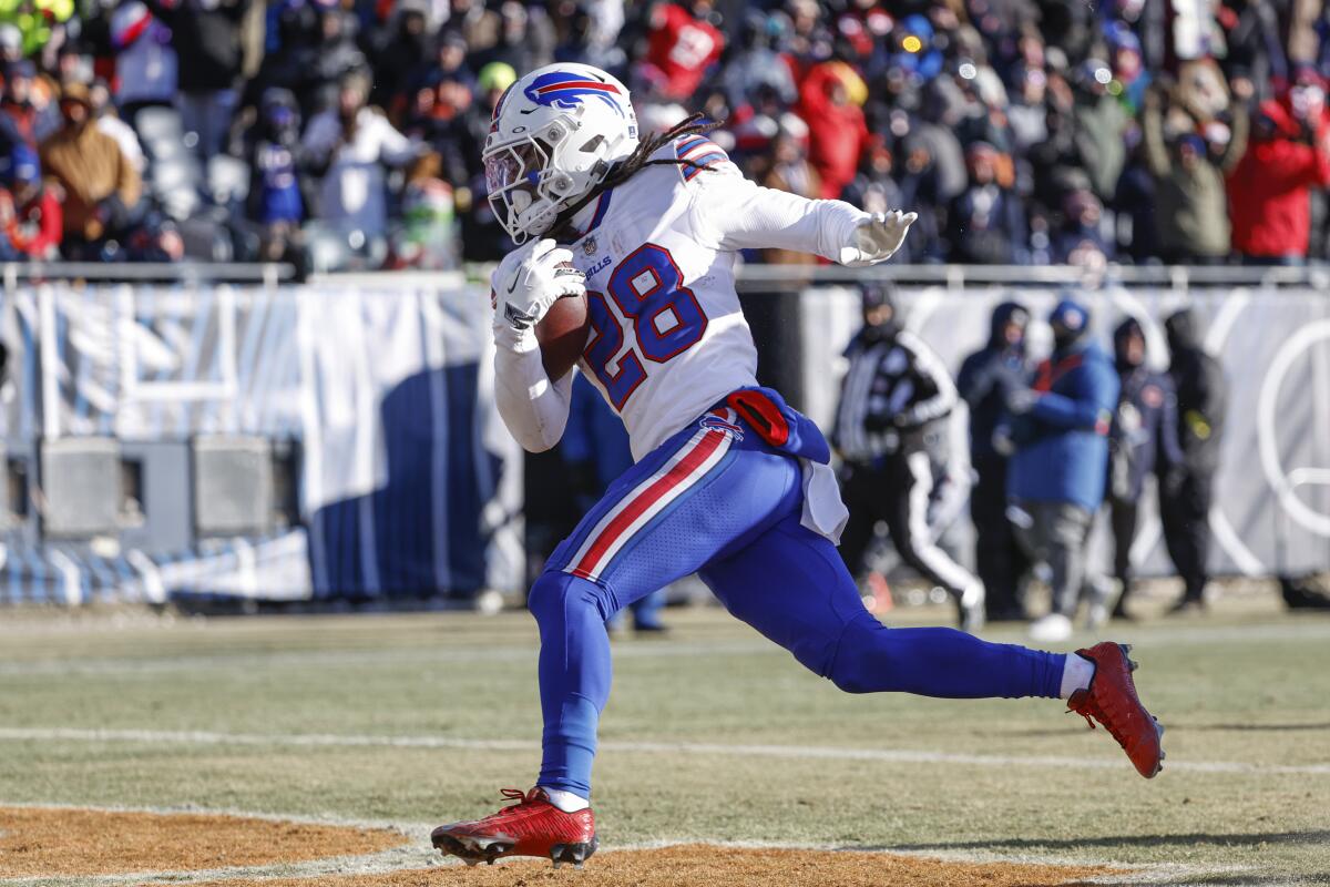 Buffalo Bills running back James Cook runs in for a touchdown during the second half against the Chicago Bears.