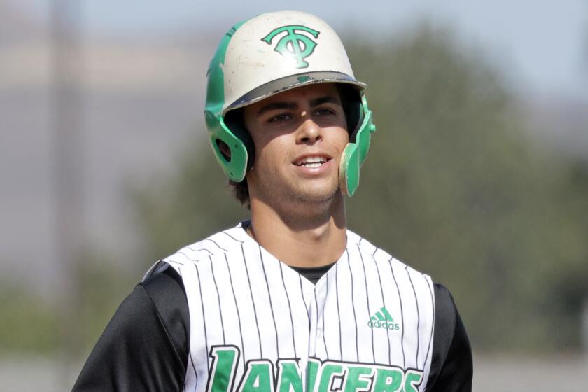 Thousand Oaks High School shortstop Max Muncy runs home following a home run 