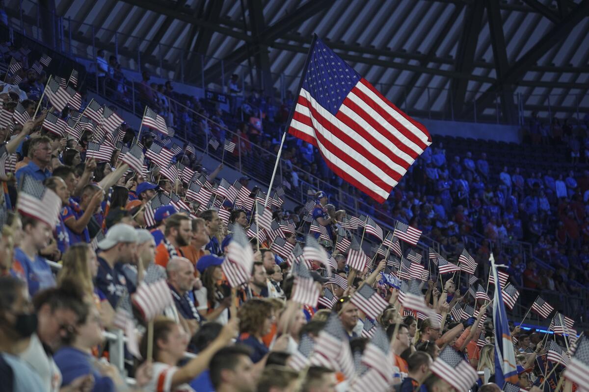 FC Cincinnati fans wave American flags in remembrance of the 20th anniversary of the September 11th terrorist attacks.