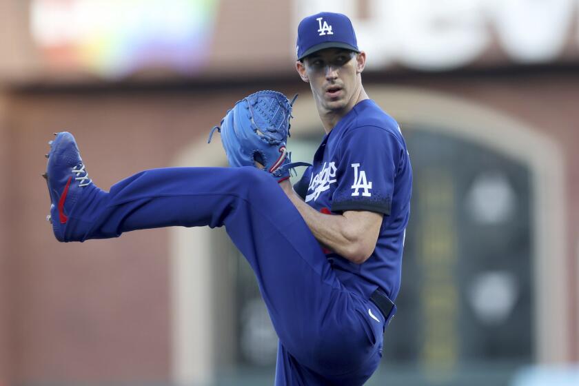 Los Angeles Dodgers' Walker Buehler (21) pitches against the San Francisco Giants.