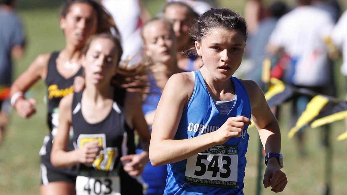 Corona del Mar High's Annabelle Boudreau (543), shown running at the Orange County Championships on Oct. 14, 2017, placed second in the small schools race of the Orange County Championships on Friday.