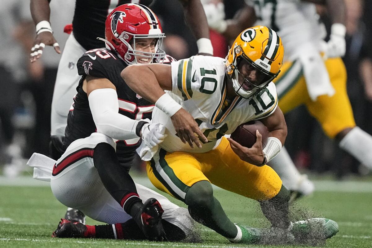 Love takes blame for crucial botched quarterback sneak in Packers' 25-24  loss to Falcons - The San Diego Union-Tribune