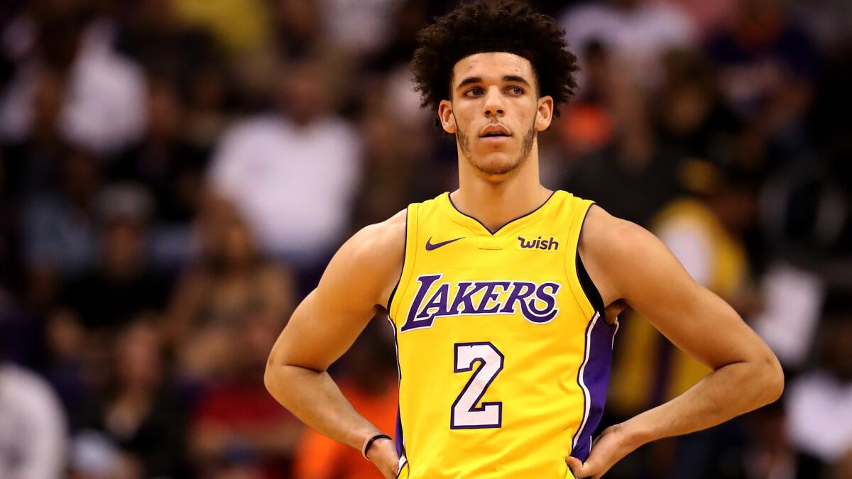 Lonzo Ball catches his breath during a break in the action Monday night in Phoenix. Ball played 28 minutes but wasn't on the court in the fourth quarter after Jordan Clarkson replaced him late in the third and rallied the Lakers into the lead.