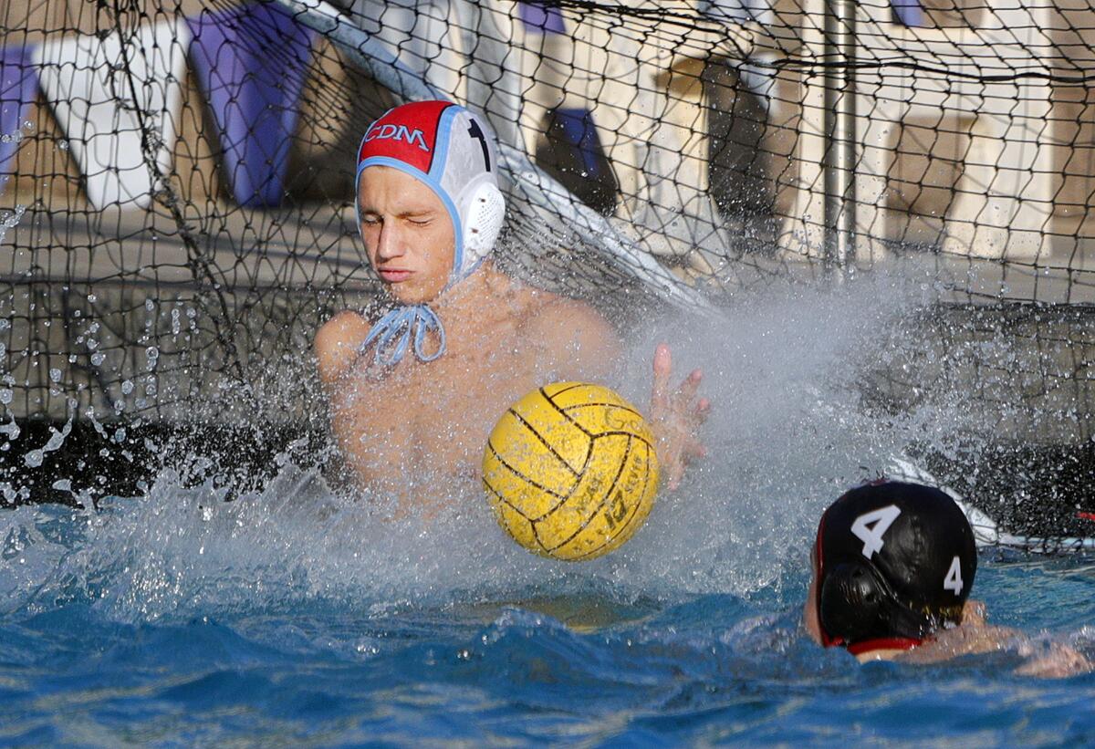 Corona del Mar goalkeeper Harrison Smith stops a La Serna shot in the first round of the CIF Southern Section Division 2 playoffs on Wednesday at Whittier College.