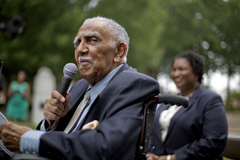 FILE - In this Aug. 14, 2013, file photo, civil rights leader the Rev. Joseph E. Lowery speaks at an event in Atlanta announcing state lawmakers from around the county have formed an alliance they say will combat restrictive voting laws, Lowery, a veteran civil rights leader who helped the Rev. Dr. Martin Luther King Jr. found the Southern Christian Leadership Conference and fought against racial discrimination, died Friday, March 27, 2020, a family statement said. He was 98. (AP Photo/David Goldman, File)