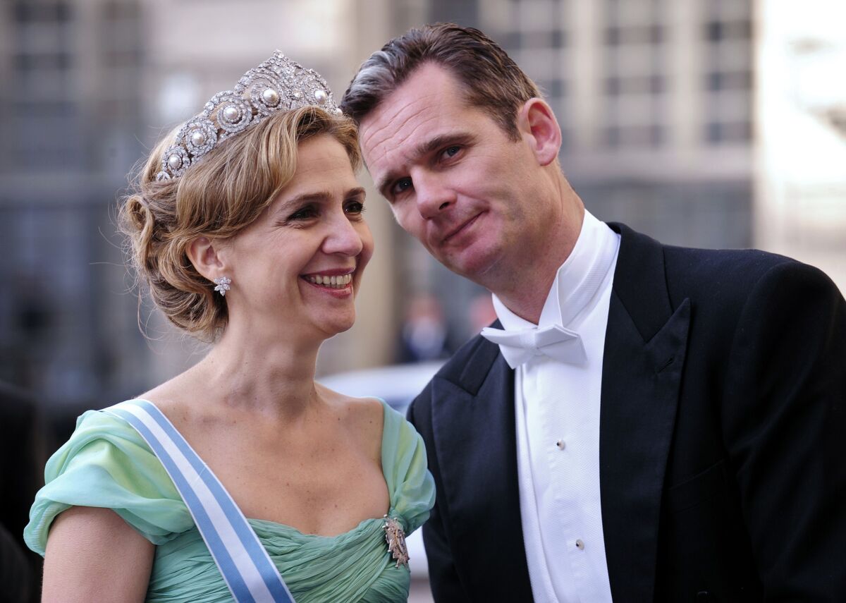 A picture taken on June 19, 2010, shows Infanta Cristina of Spain and her husband, Inaki Urdangarin, arriving at a banquet in Stockholm.