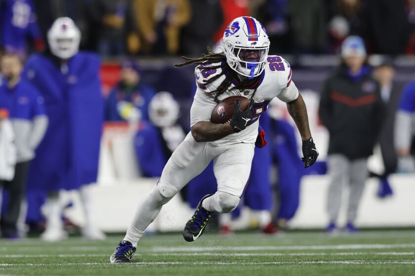 Buffalo Bills running back James Cook (28) during the second half of an NFL football game, Thursday, Dec. 1, 2022, in Foxborough, Mass. (AP Photo/Michael Dwyer)
