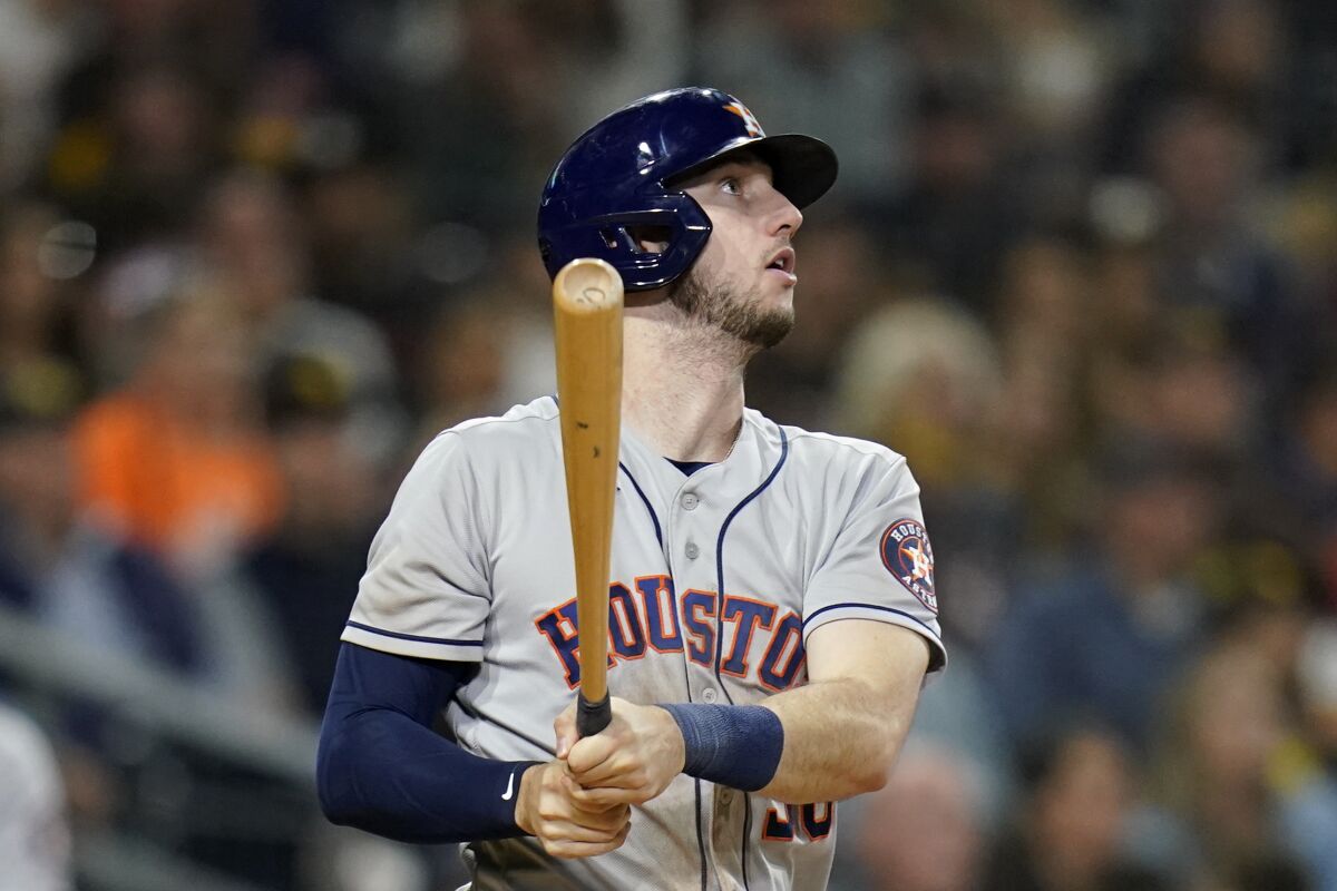 Houston Astros' Kyle Tucker watches his two-run home run during against the San Diego Padres during the eighth inning of a baseball game Friday, Sept. 3, 2021, in San Diego. (AP Photo/Gregory Bull)