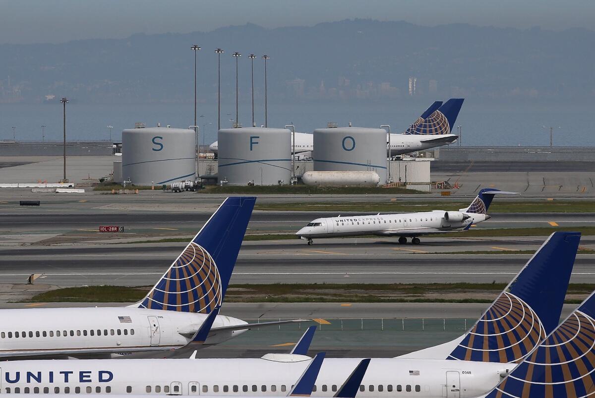 A United Airlines plane taxis on the runway at San Francisco International Airport on March 13.