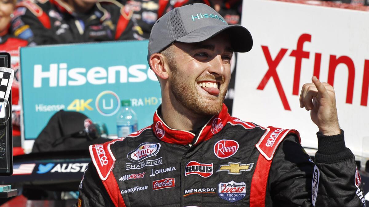Austin Dillon celebrates after winning Saturday's NASCAR Xfinity Series race at Charlotte Motor Speedway.