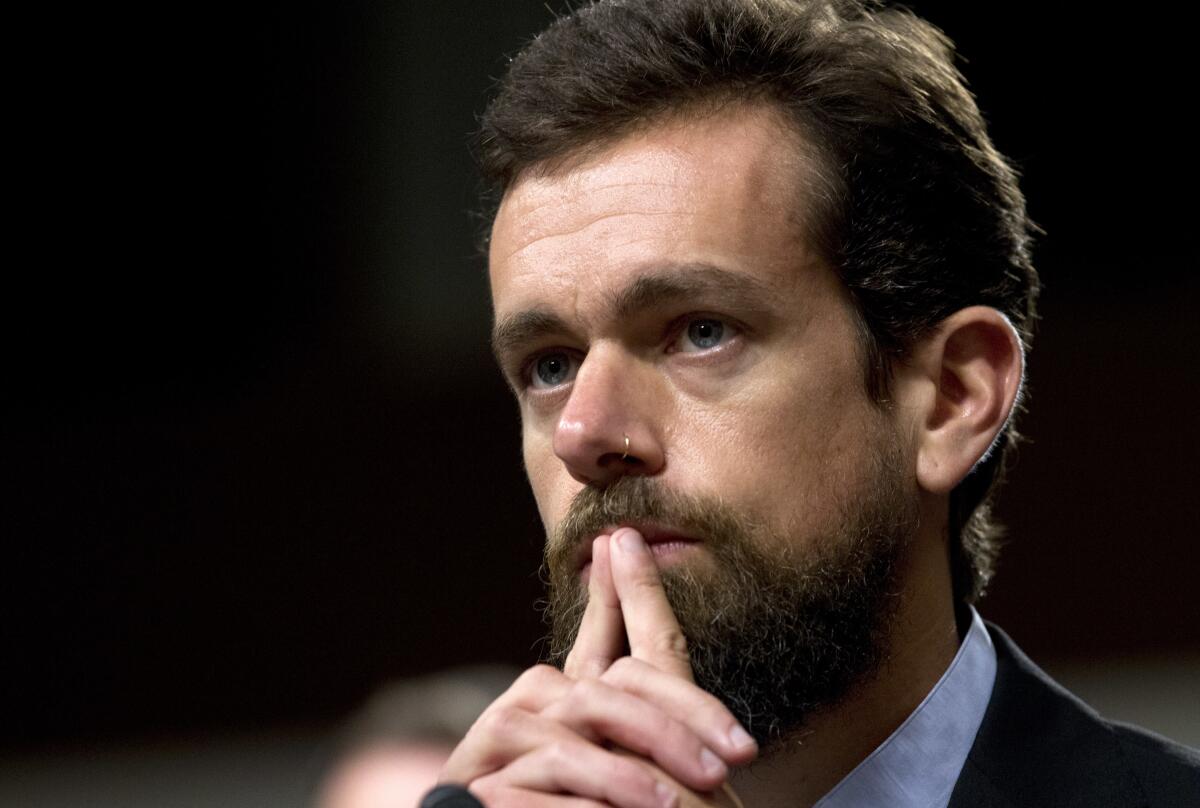 Twitter Chief Executive Jack Dorsey has his fingers under his chin.