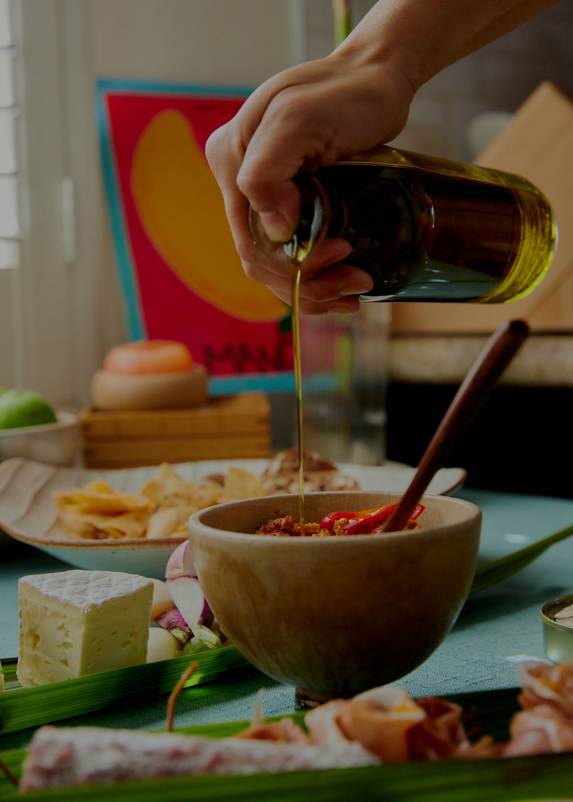A healthy replenishing of olive oil at Saehee Cho's table.