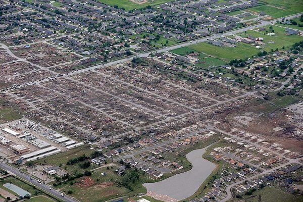 An aerial view shows the tornado's path through a residential area in Moore, Okla.