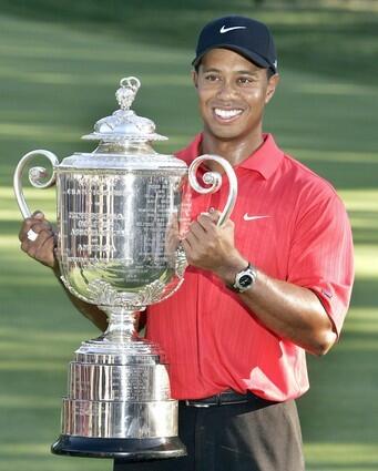 Tiger Woods with the trophy